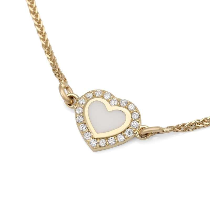 Collier pendentif cœur orné de diamants en or jaune 14 carats