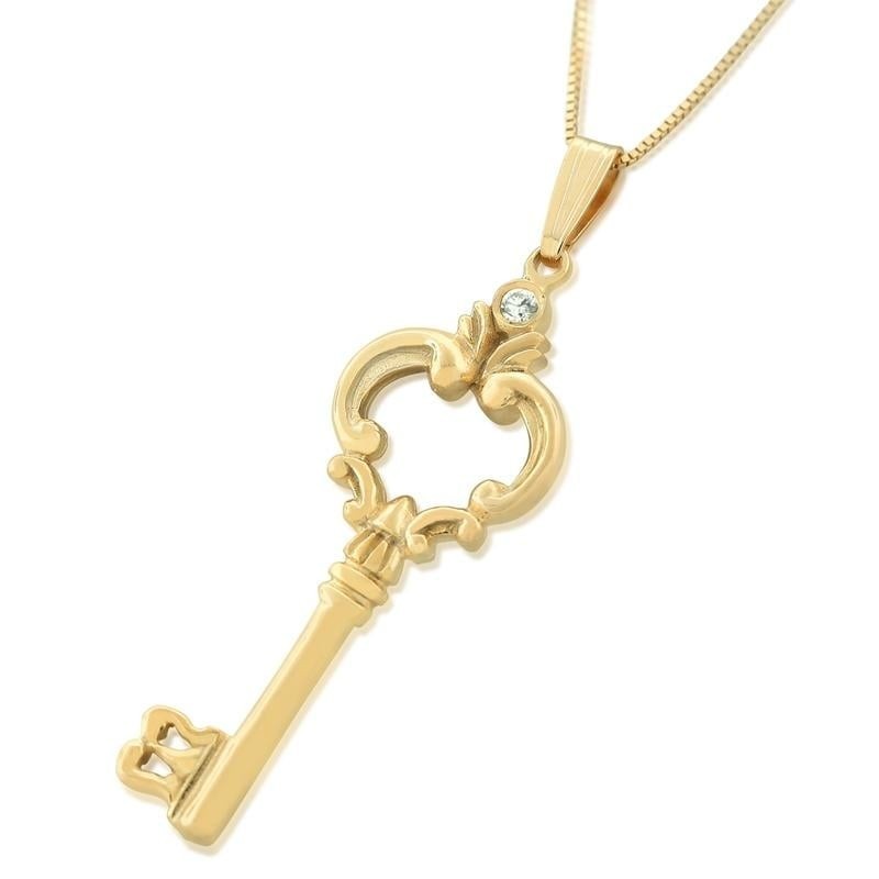 Pendentif clé en or jaune 14 carats et diamants