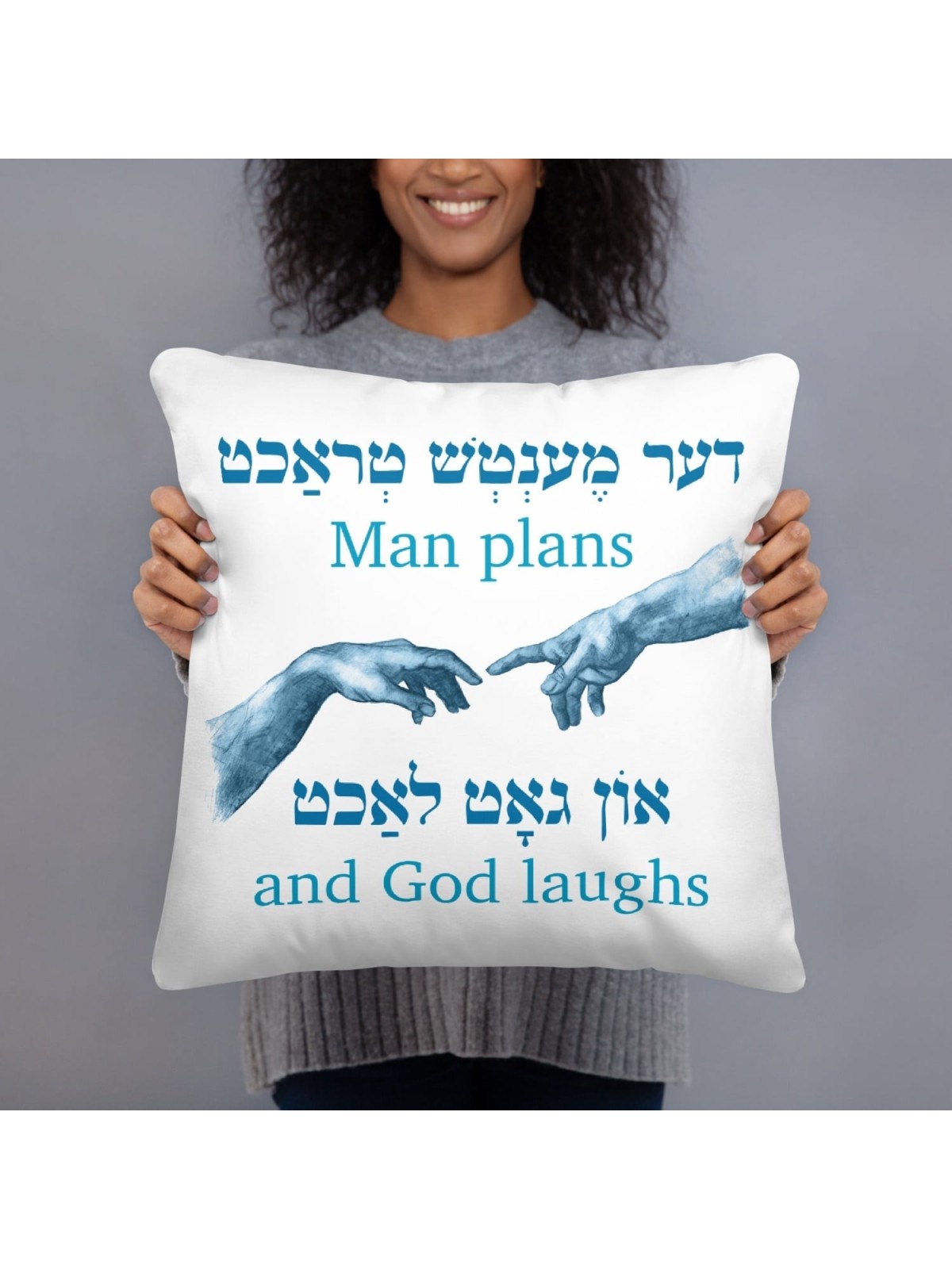 Coussin avec citation yiddish « Man Plans and God Laughs »