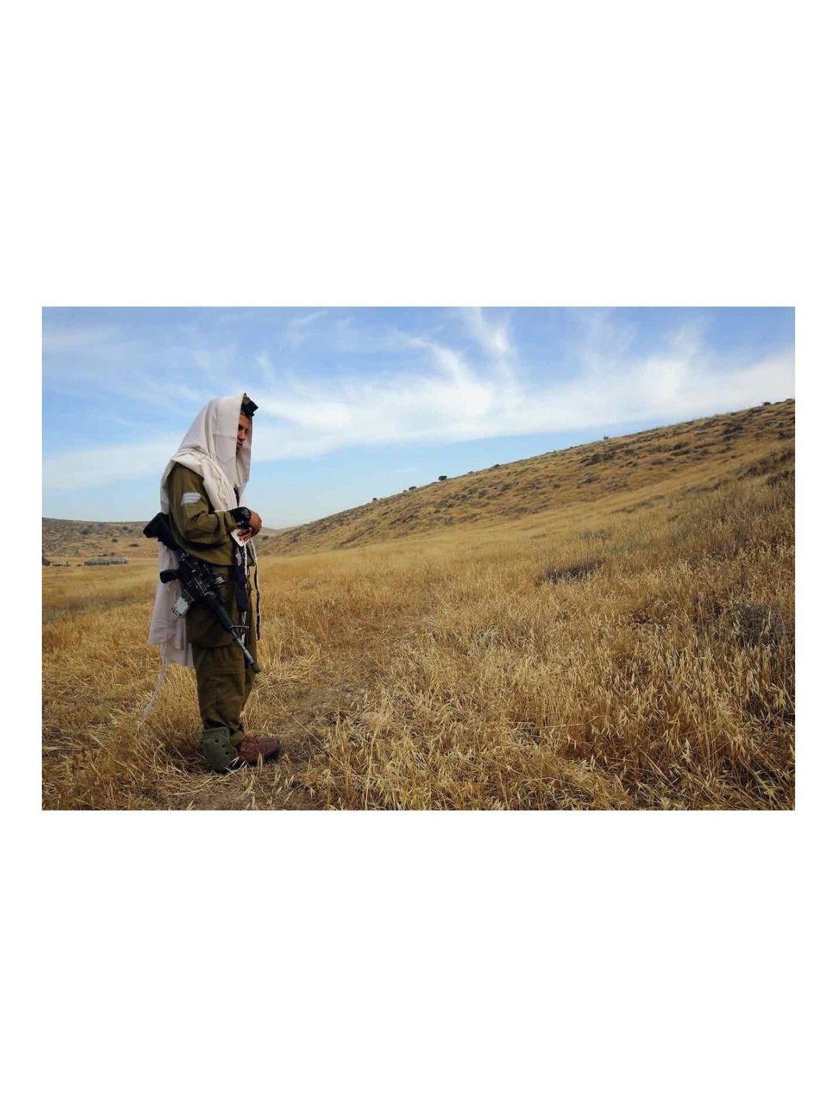 IDF Soldier at Prayer Photograph by Oren Cohen