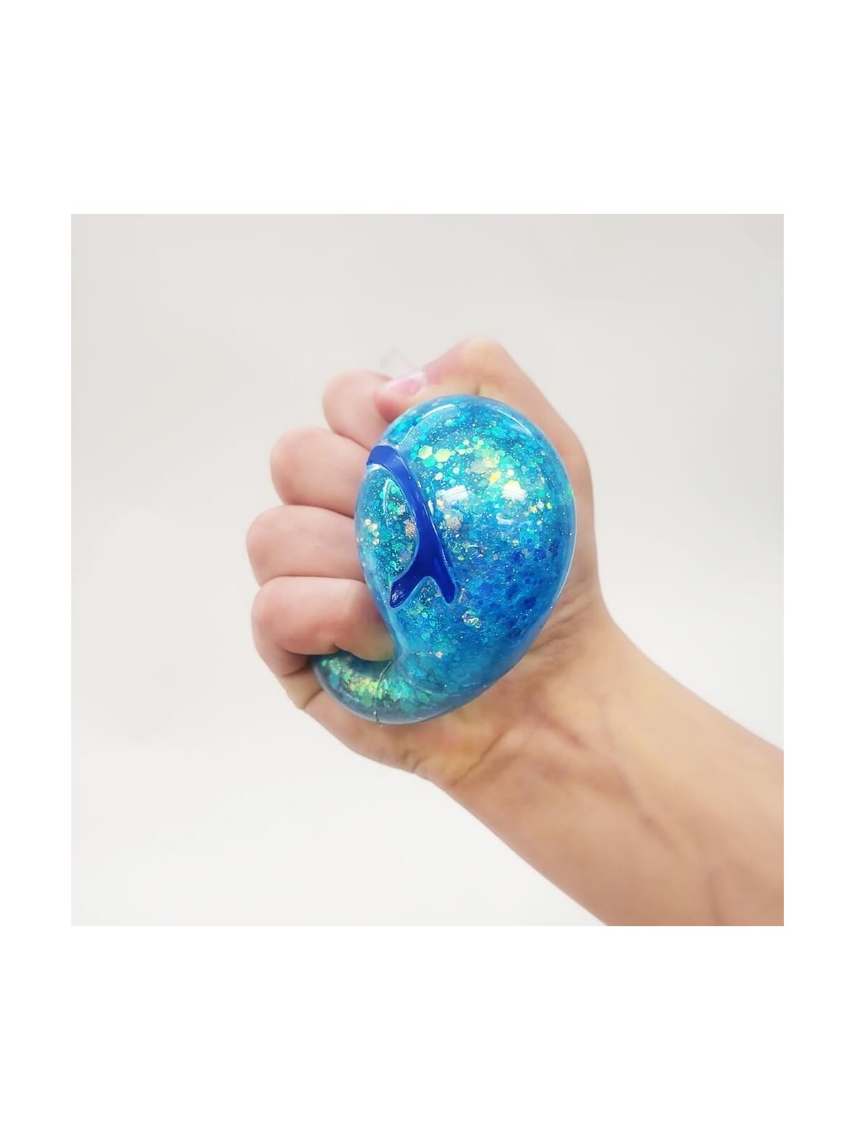 Squish Dreidel Filled With Iridescent Glitter | All Judaica | Judaica